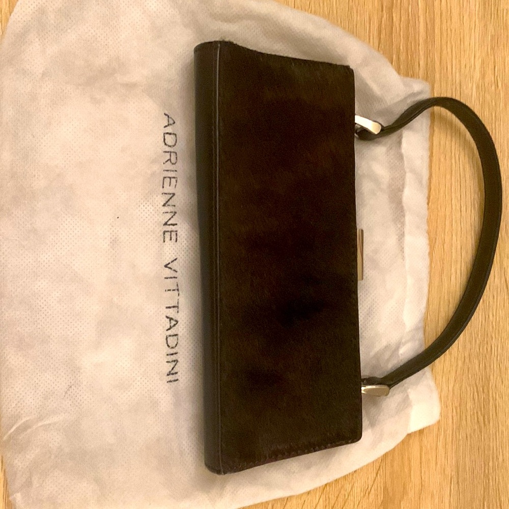 Adrienne Vittadini black leather and calf hair evening bag.